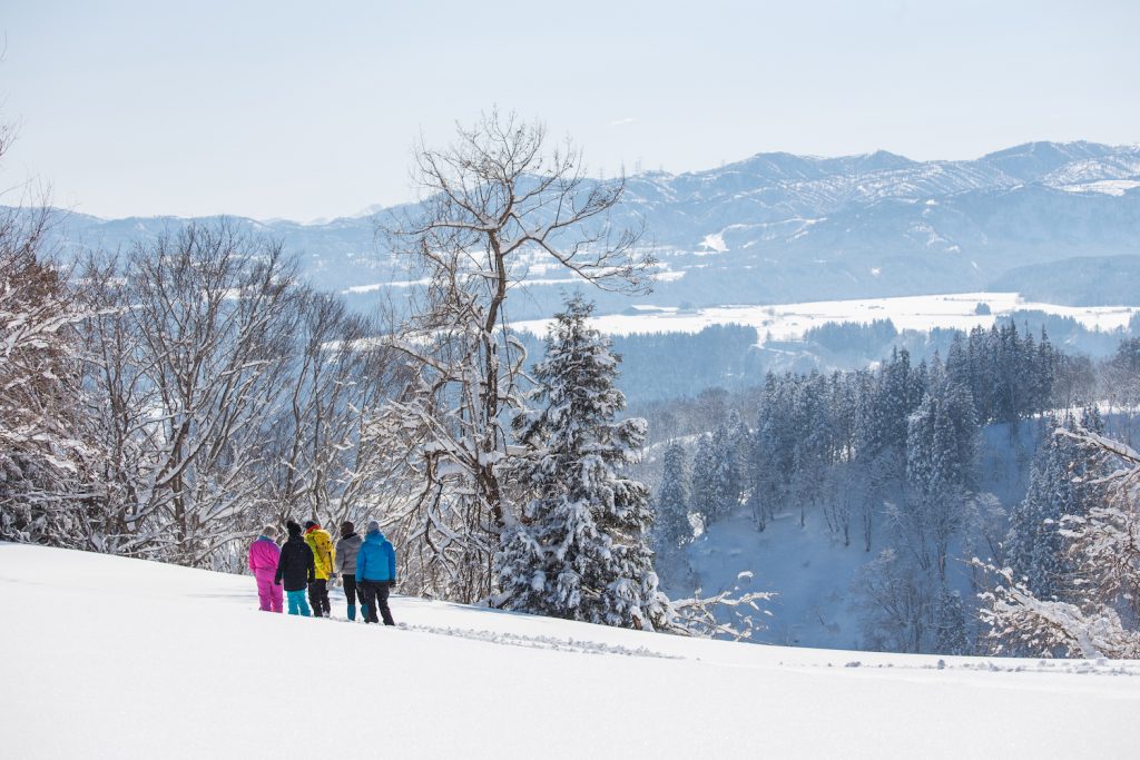 Snow trekking in a vast landscape